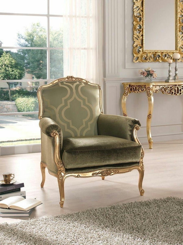  A lavish armchair with a gilded gold carved frame, upholstered in dark green velvet on the seat and armrests, and a patterned light green fabric on the backrest.